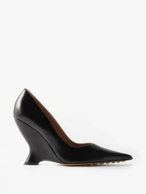 Black wedge-heel leather pumps