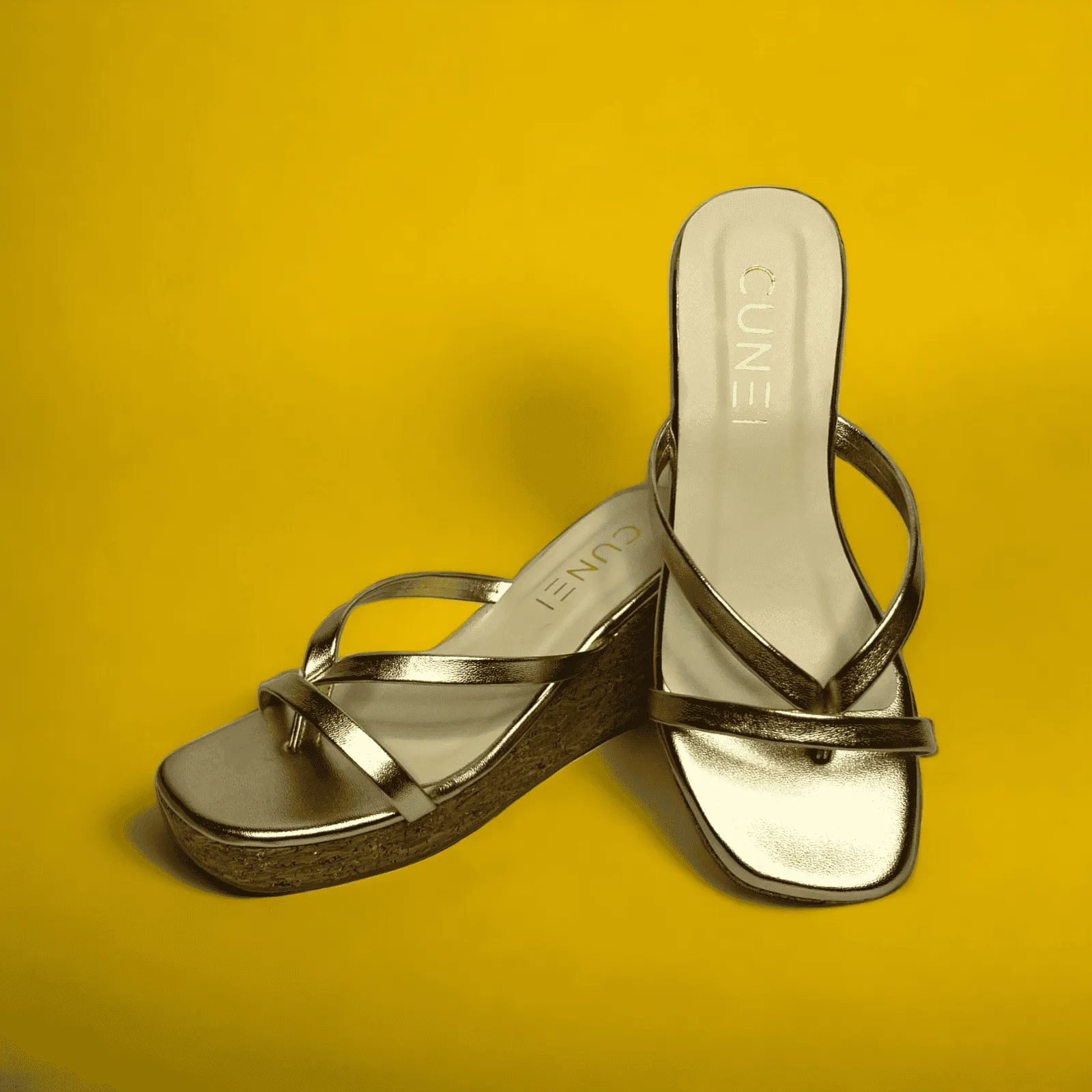 Sleek and Stylish Golden Wedges