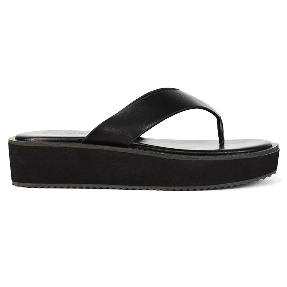 Tammi Thong Strap Flatform Flip Flop Sandal Slides in Black Synthetic Leather